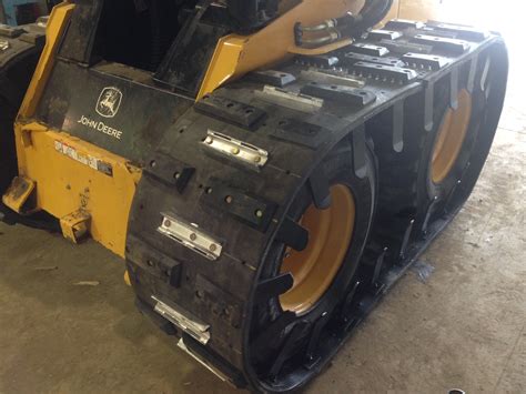 snow cleats for track skid steer|track studs for skid steer.